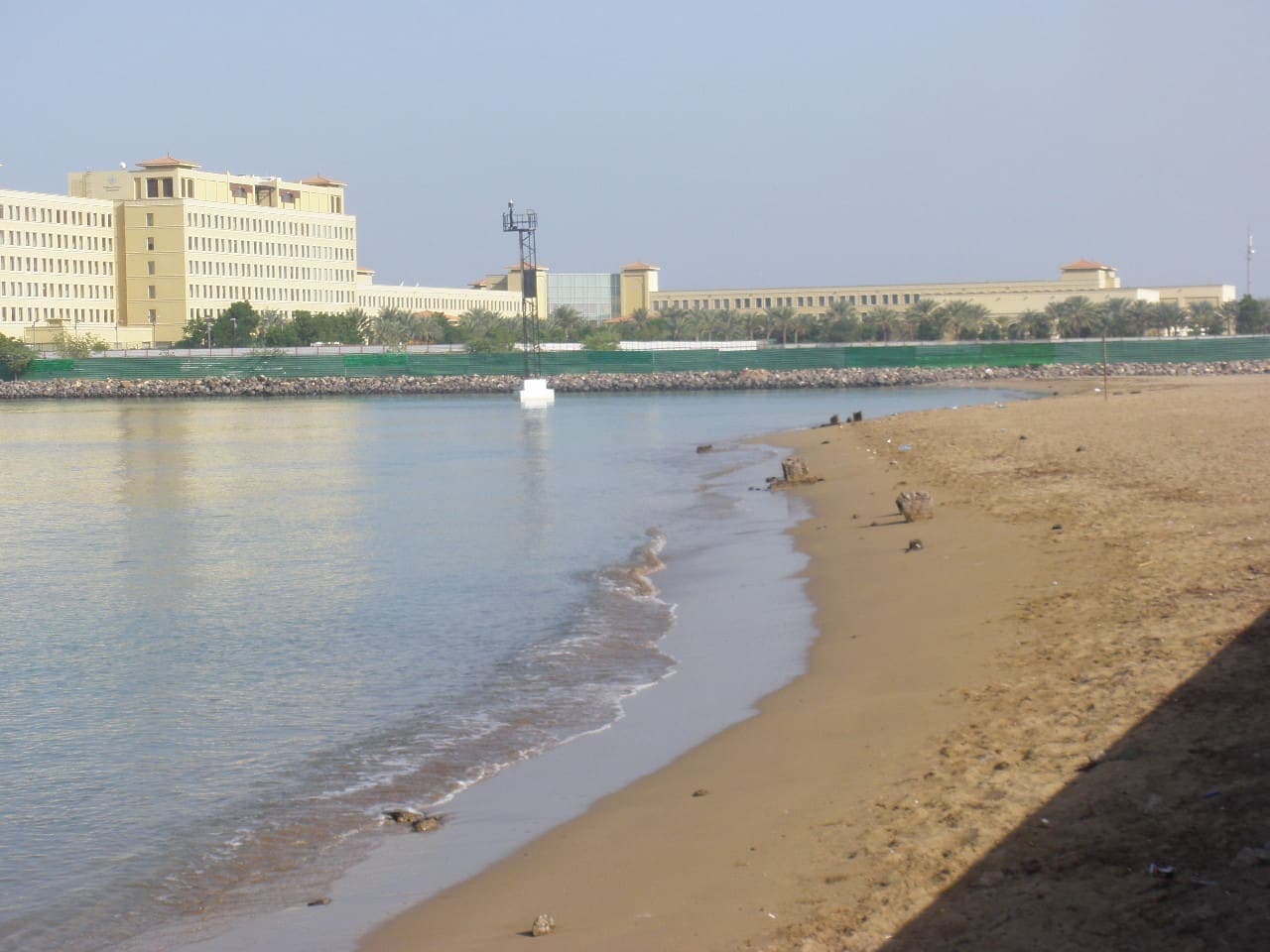 Beach and hotel buildings of the Kempinski peninsula